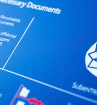 Immagine di un documento blu sul trasferimento e il collegamento del gas in primo piano, con lo sfondo sfocato.